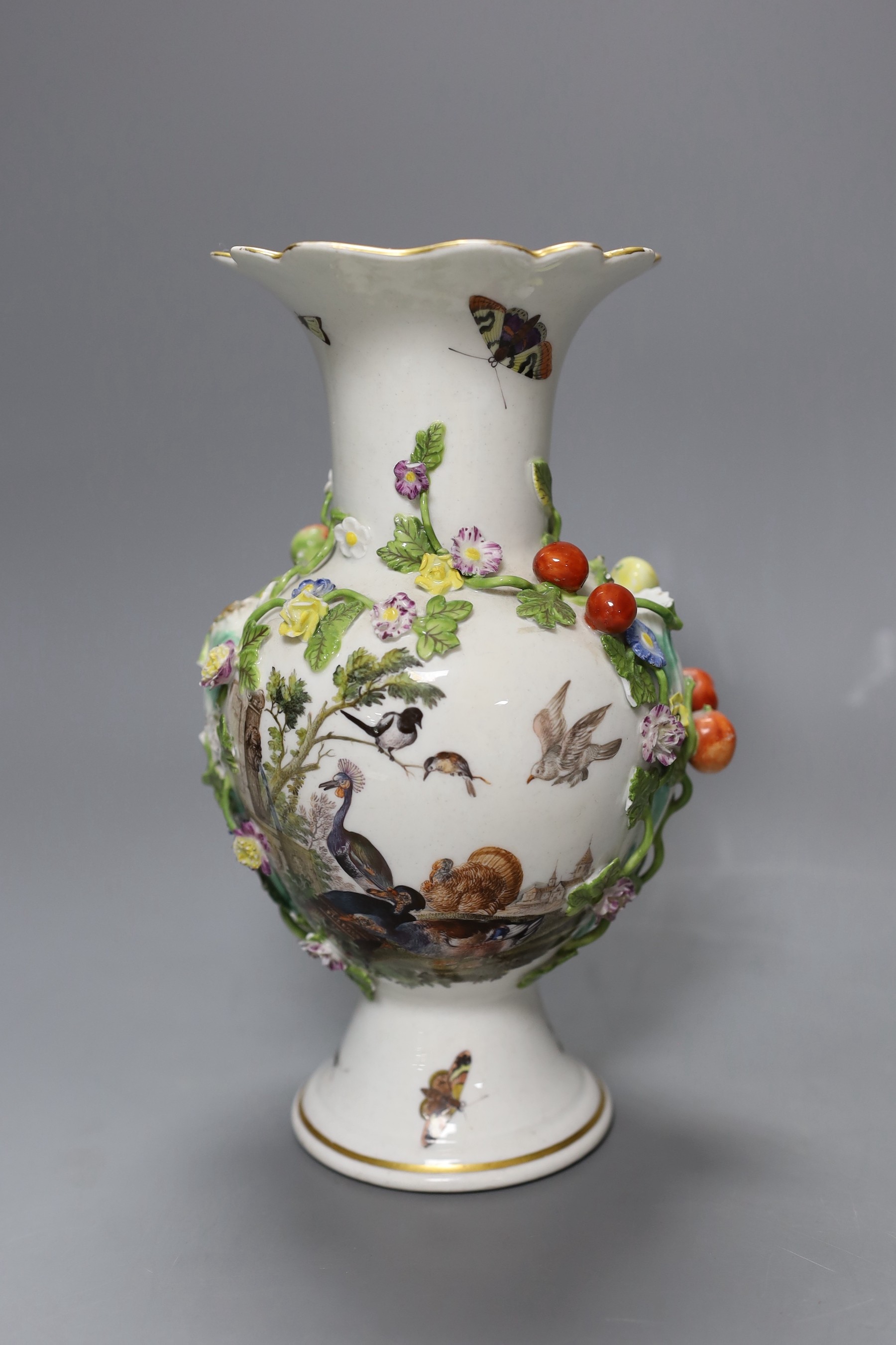 A 19th century Meissen floral encrusted vase decorated with birds and insects, 22cm